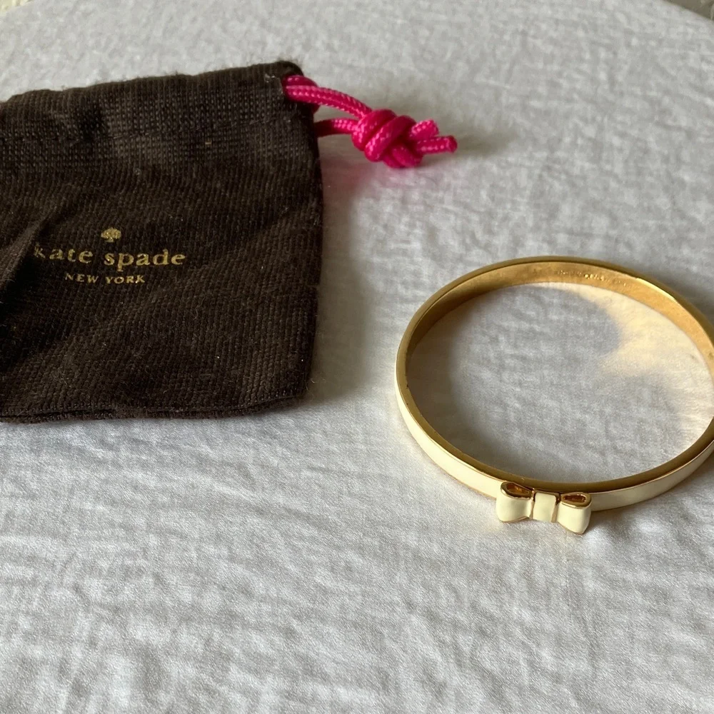 Kate Spade: “Take a Bow” Cream & Gold Tone Bow Bracelet & Dust Bag - Picture 8 of 11